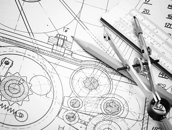 Black-and-white engineering drawing with a pencil, compass, and scale ruler placed over detailed mechanical sketches and measurements.