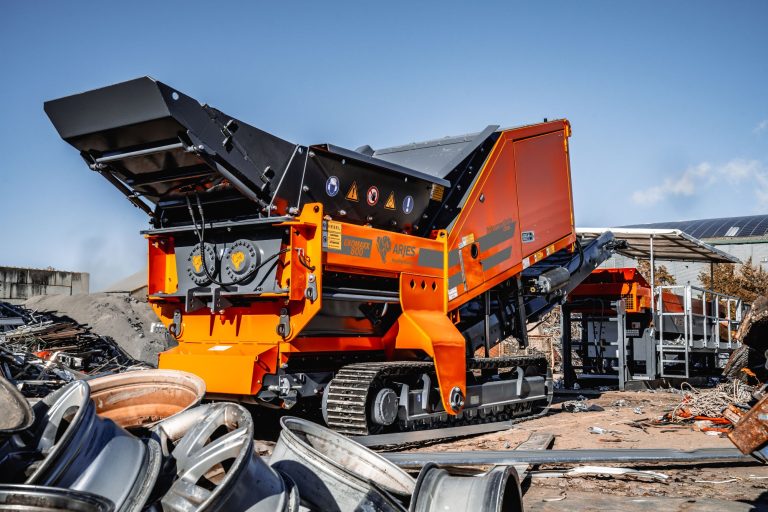 A heavy equipment machine featuring multiple tires and wheels.