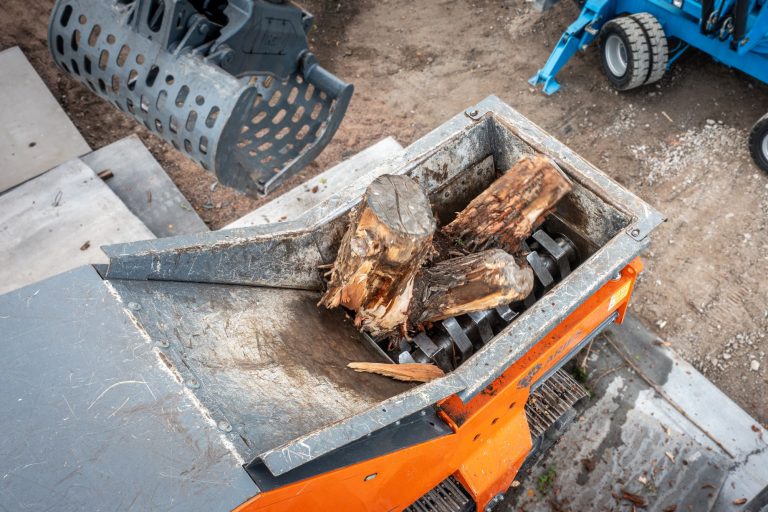 A heavy equipment machine featuring large wheels and tires, showcasing its robust design.